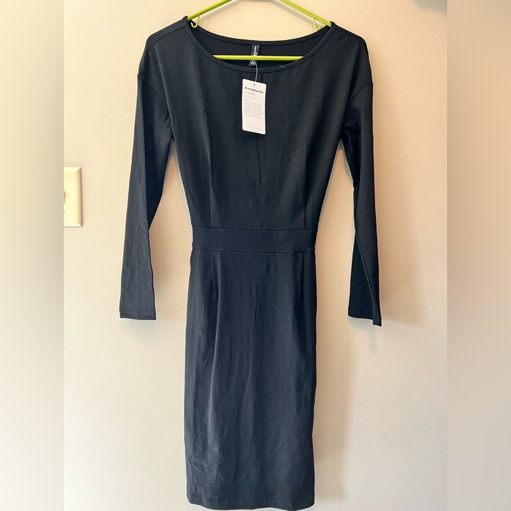 Prettygarden NWT size 3 black knit long sleeve tie back pocketed dress.
